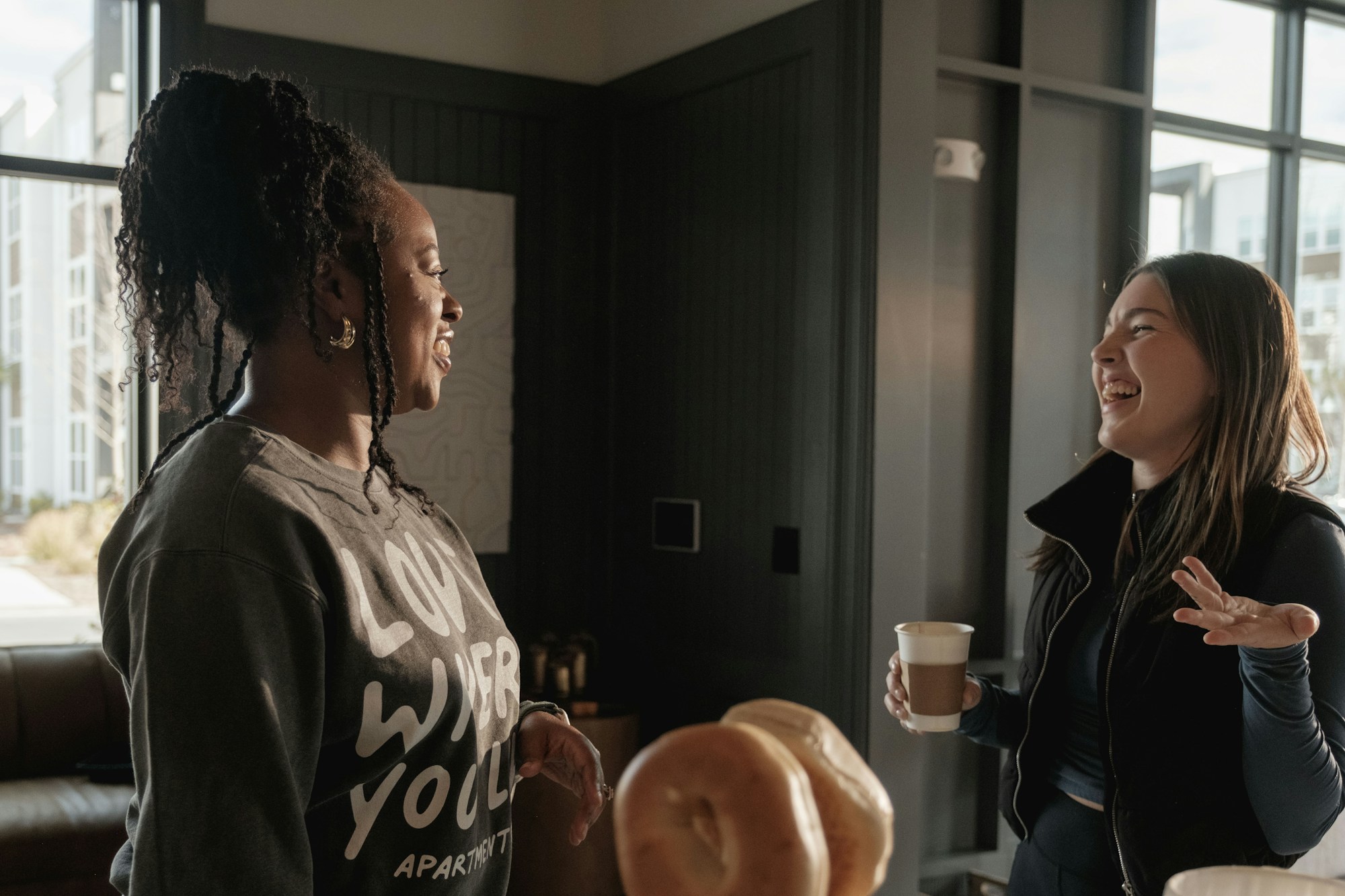 Two adults having a relaxed, supportive conversation